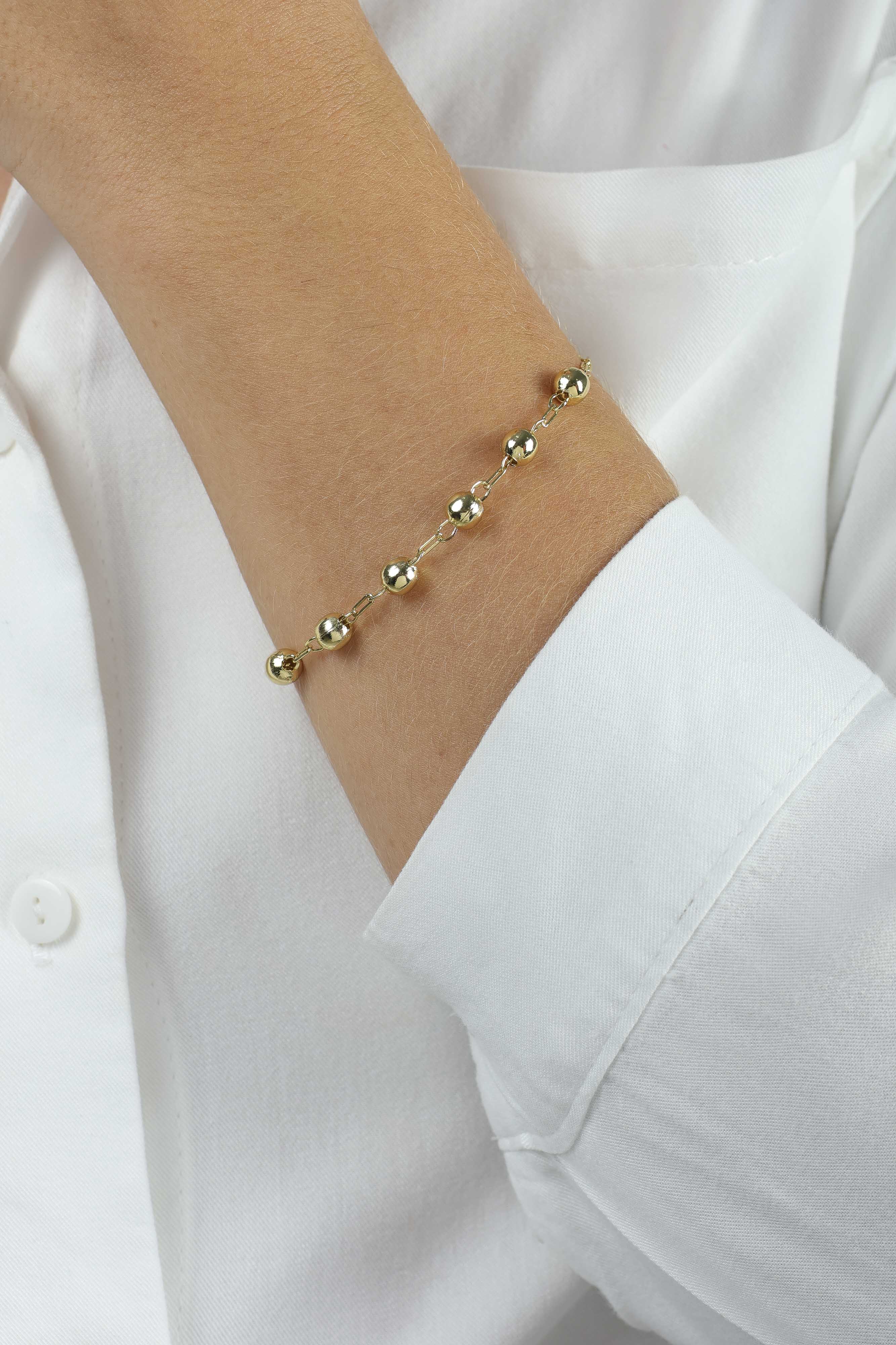 PULSEIRA ELO CARTIER E BOLINHAS LECCE — foto 1